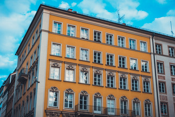 Fototapeta na wymiar Modern Yellow Low Rise Building in Munich, Germany