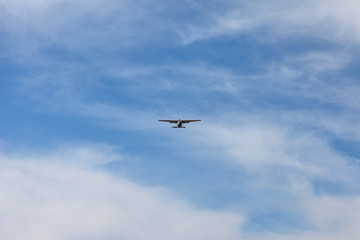 Fototapeta na wymiar small propeller aircraft in the sky