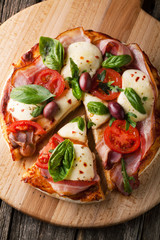 Delicious pizza with bacon and mozzarella cheese