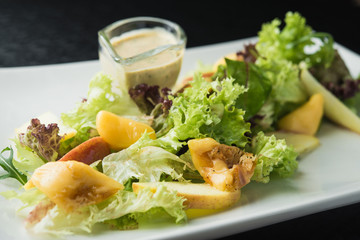 fresh salad with pears and leaf