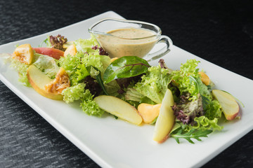 fresh salad with pears and leaf