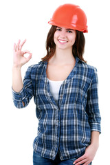 Happy woman in builder uniform