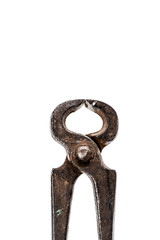Old iron cutting pliers, tongs or nippers isolated on white.