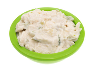 Bowl of chicken salad isolated on a white background