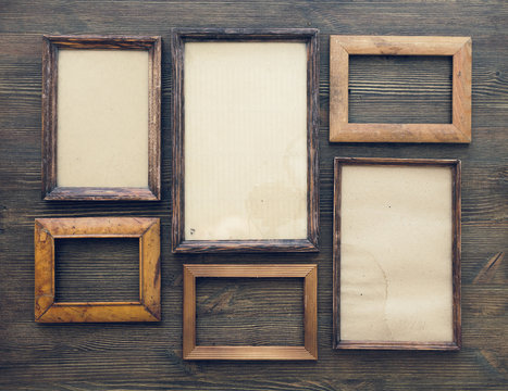 frames on wooden wall
