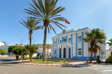 Fototapeta na wymiar Hotel de Ville, (town hall) in Plaza de Espana in the town of Sidi Ifni, Atlantic coast of Morocco.