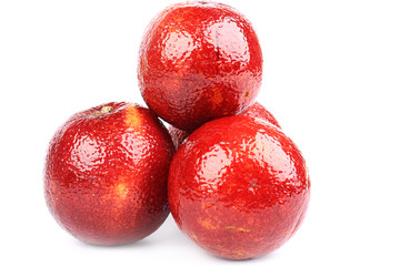 blood red oranges isolated on white background