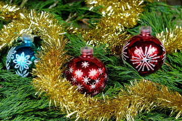 Red and one blue Christmas balls