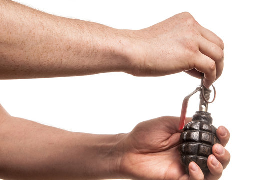 Man hold the fragmentation grenade