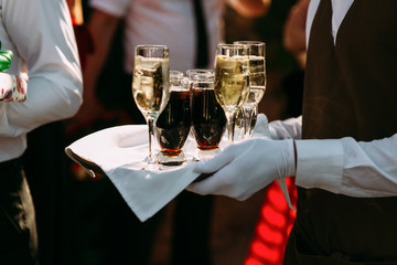Server with the different alcohol drinks