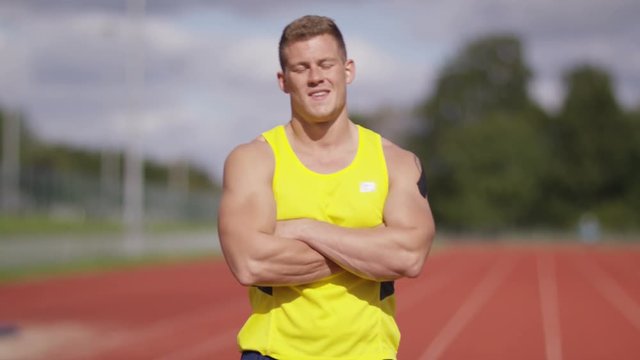  Portrait of smiling disabled athlete with prosthetic leg 