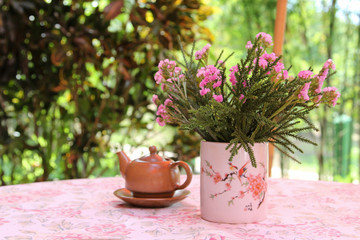 Brown chinese teapot on the table.