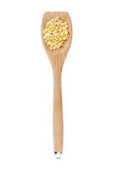 corn in wooden spoon