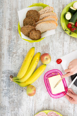A woman's hand with food
