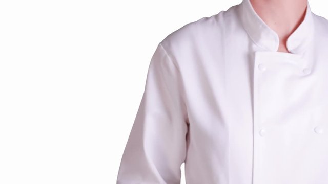 cuisinier qui touche un &eacute;cran tactile sur fond blanc