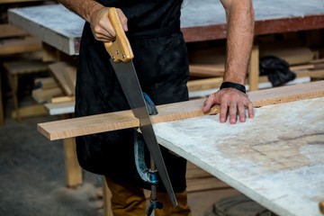 Carpenter working on his craft