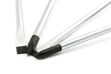 different metal screwdrivers on white