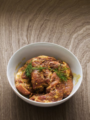 Bowl with marinated pork.