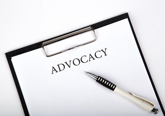 document with the title of advocacy and pen
