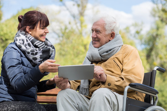 Senior man using tablet