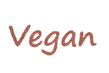 Wort Vegan als Schriftzug aus Adzukibohnen als Freisteller