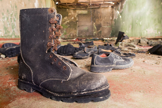 Military footwear in abandoned artillery.