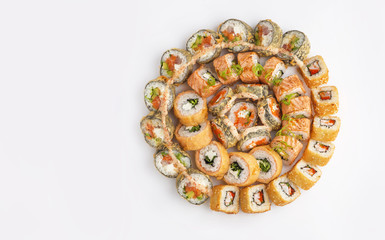 Big round sushi set with different kind of rolls
