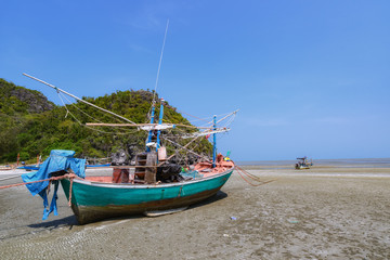 Fototapeta na wymiar Fishing boats at the Gulf of Laem Sala beach Prachuap Khiri Kha
