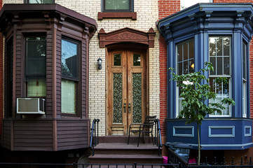 an ornate door on a big city building