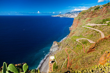 winding road leading to the beach Ponta do Garajau