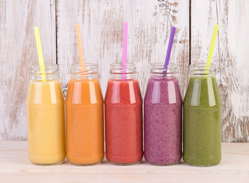 Fruit smoothies variety in rainbow colors