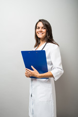Woman doctor holding a document