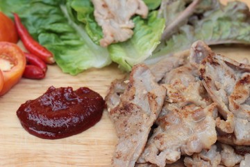 grilled pork korean food with chilli sauce.