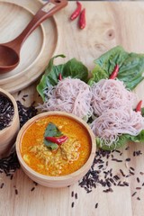 Thai curry with riceberry rice noodle .