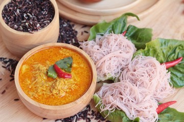 Thai curry with riceberry rice noodle .