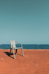 a beautiful chair in front of a nice and relax sea beach view. I took it on my vacation. Love the color of it.