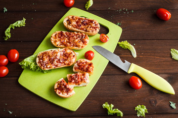 mini baguettes with ham, onion, peppers, lettuce and cherry tomatoes