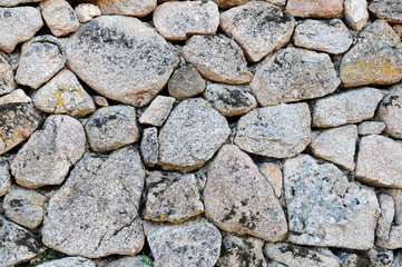 Irregular stone wall.