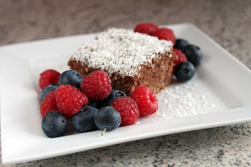 Chocolate cake served with berries
