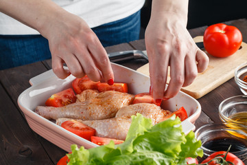 Fresh chicken meat on wooden table. Selective focus. Rustic styl