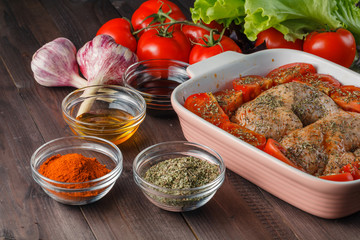 chicken legs in bowl with marinad