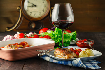 Fried chicken legs on a dark wooden background