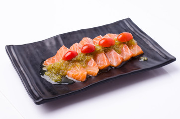 Slices of Salmon Served with Spicy Sauce