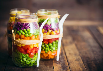 Fresh vegetable salad in a mason jar