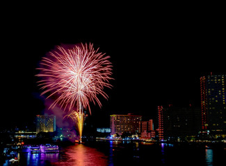 Fototapeta premium Fireworks / Colorful of fireworks on the river at night.