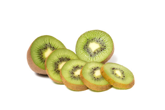 kiwi fruit and sliced segments isolated on white
