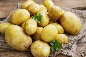 Young raw potatoes