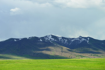 Fototapeta na wymiar Beautiful mountains. Armenia. Mountain ridge and blue sky. 
