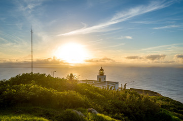 Fototapeta premium Sunset on the lighthouse cape