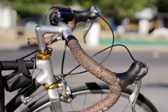 Bicycle handlebars and blurred background